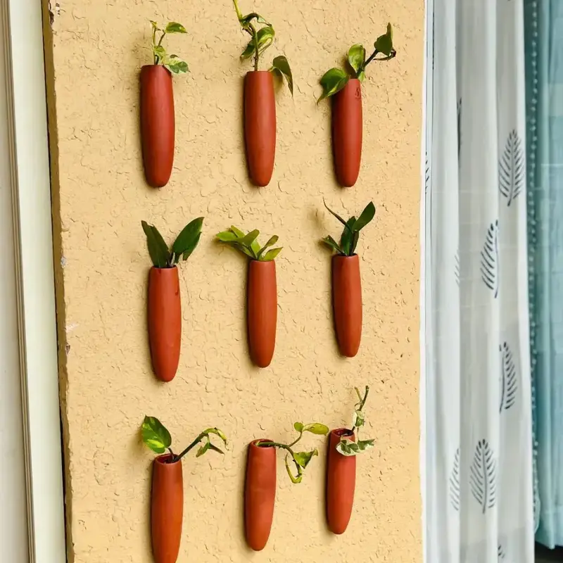 THE HANDICRAFTIAN CARROT WALL HANGING PLANTER SET OF 5 image 1
