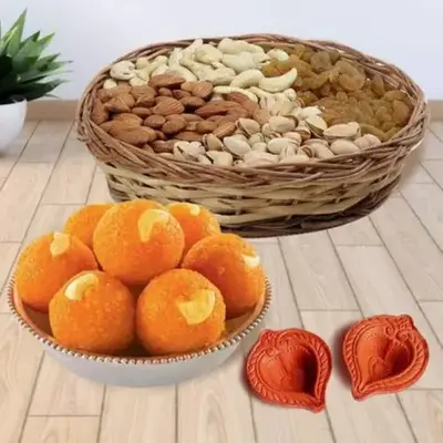 Amazingly Wrapped Basket of Laddoo Exotic Dry Fruits n Diya