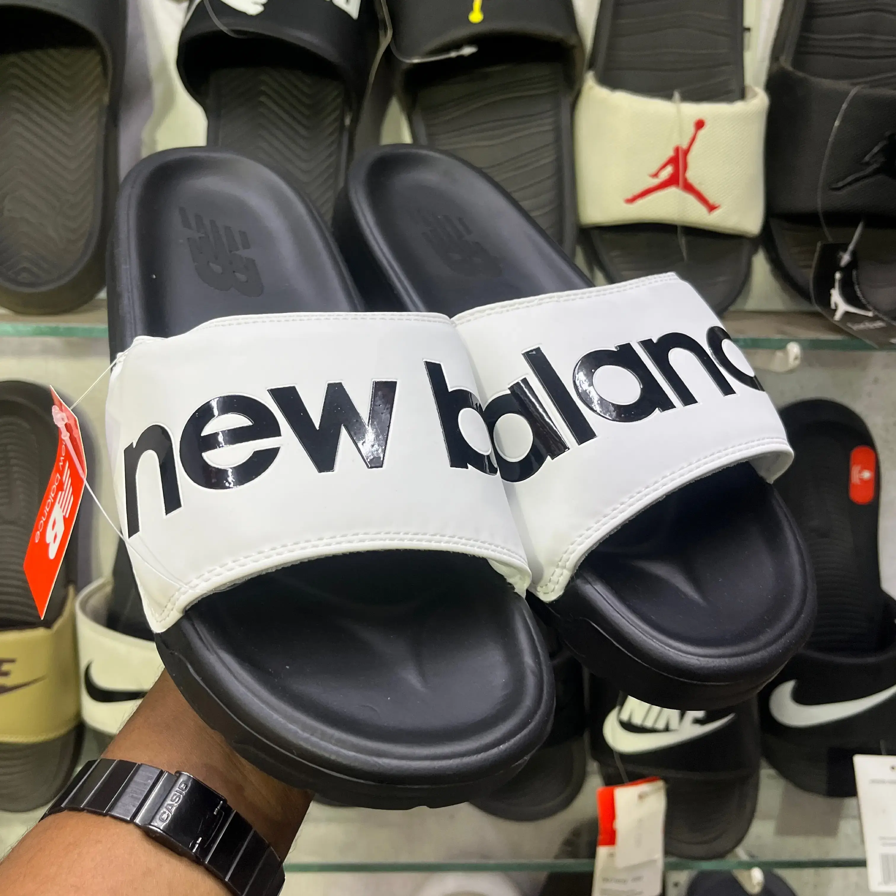 Buy Next to original new balance slides 07 online at best price