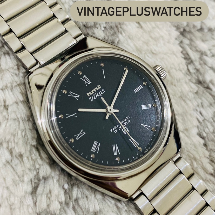 Roman dial wrist watch outlet