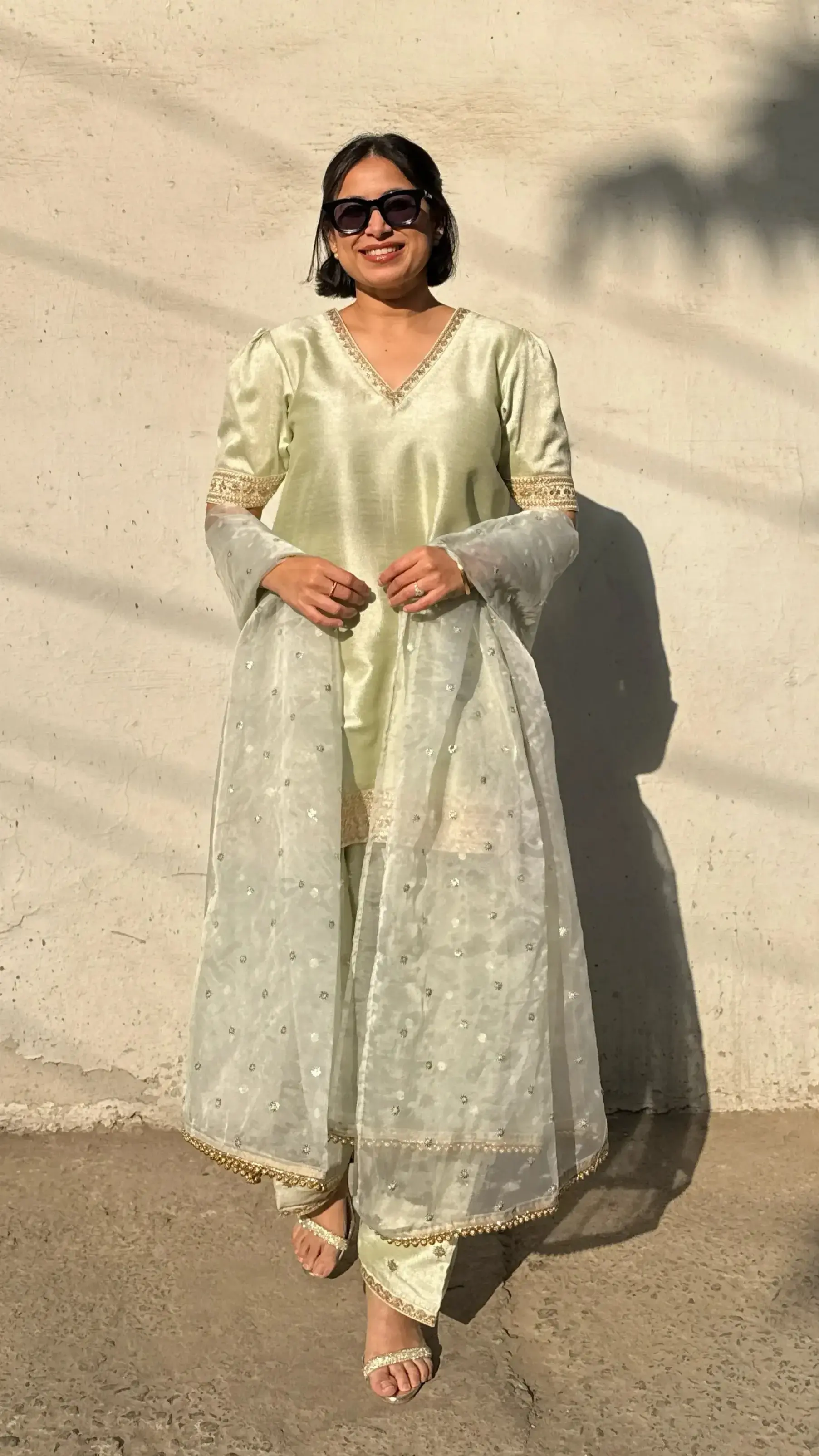 Silk festive salwar suit in jewel tone with organza dupatta, ideal for weddings and celebrations