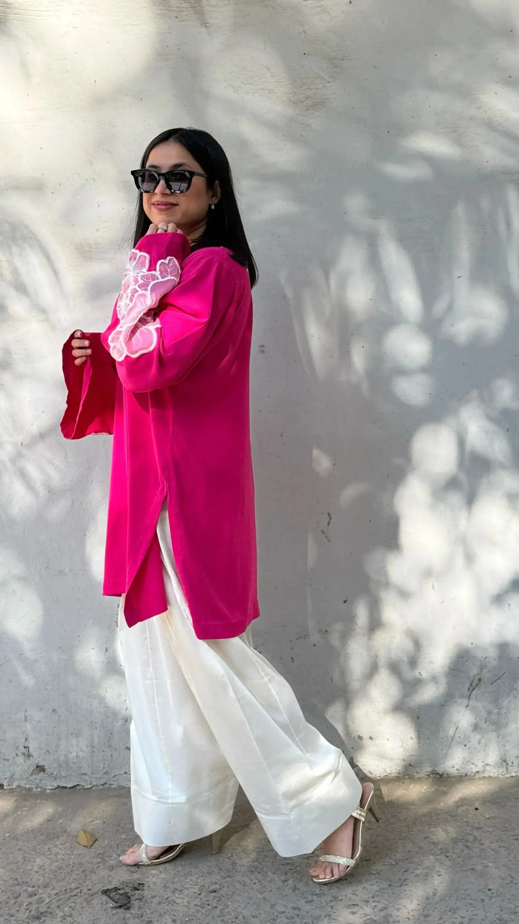 Solids Gulabi Farshi Salwar Suit Set – graceful pink haldi outfits for bride designed in Bizzy Lizzy fabric with embroidered bell sleeves by Pyoor.