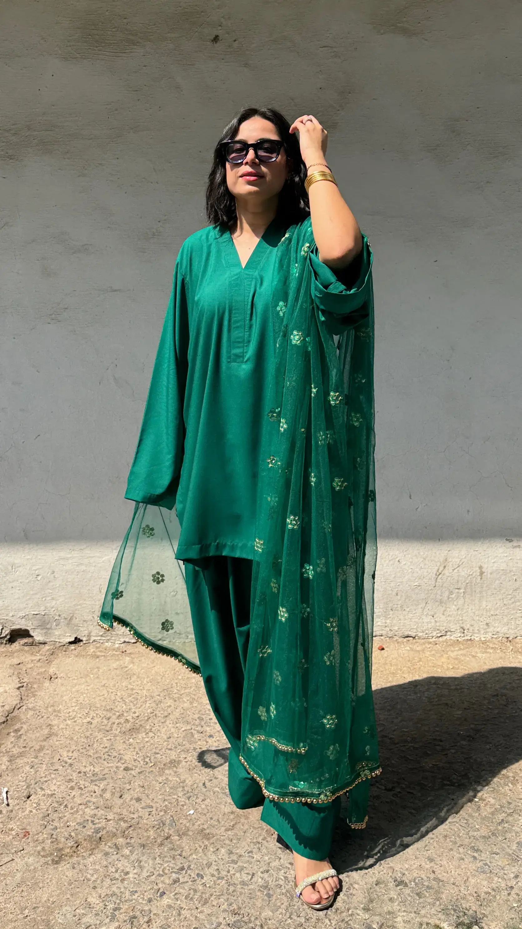Emerald Farshi Suit Set – rich green haldi outfits for bride featuring embroidered net dupatta and Bizzy Lizzy cotton fabric by Pyoor.