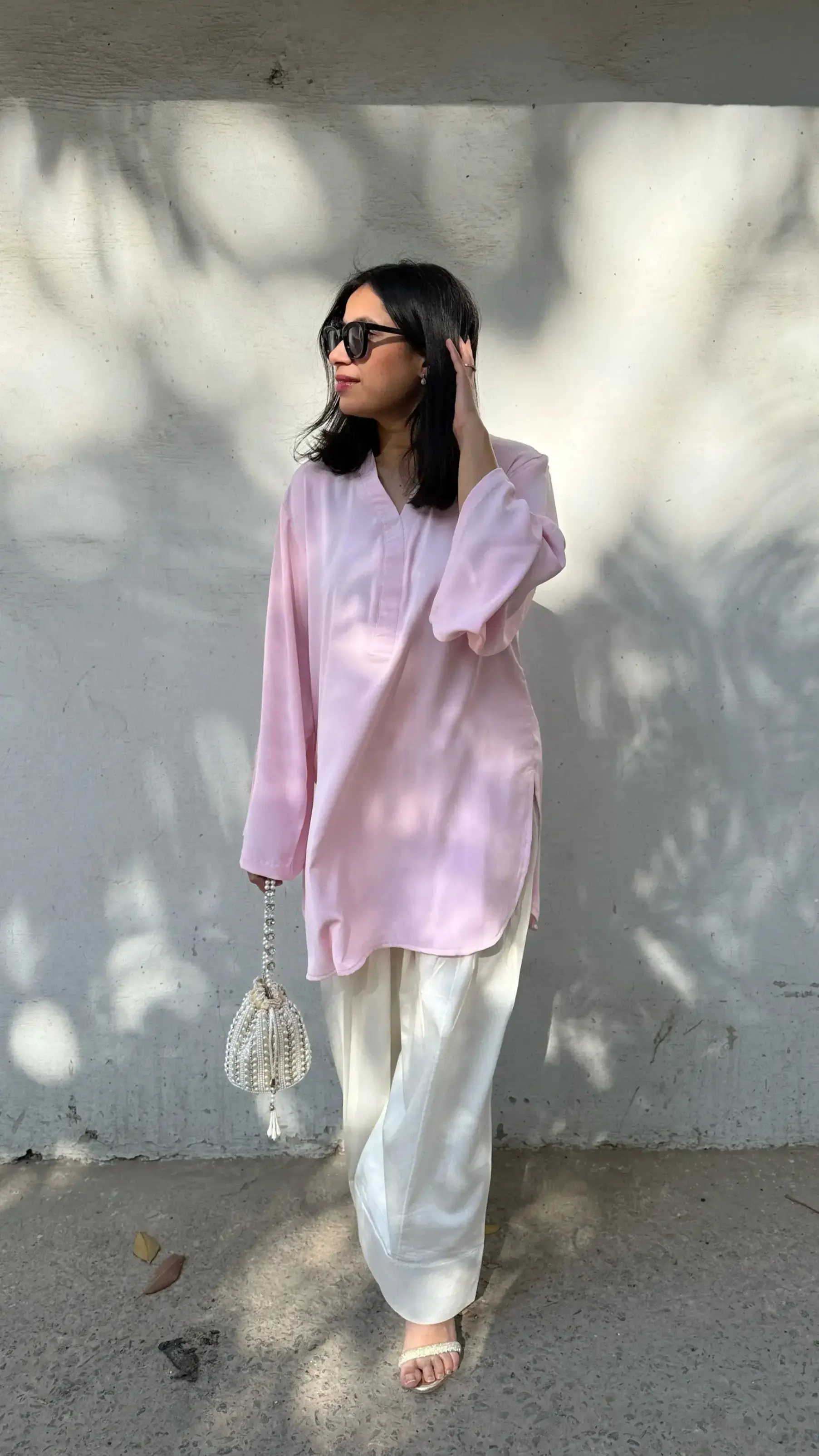 Soft baby pink Solids Farshi Salwar Suit Set by Pyoor, a comfortable Navratri outfit for women with oversized bell sleeves, perfect for daytime celebrations and Navratri outfit ideas.