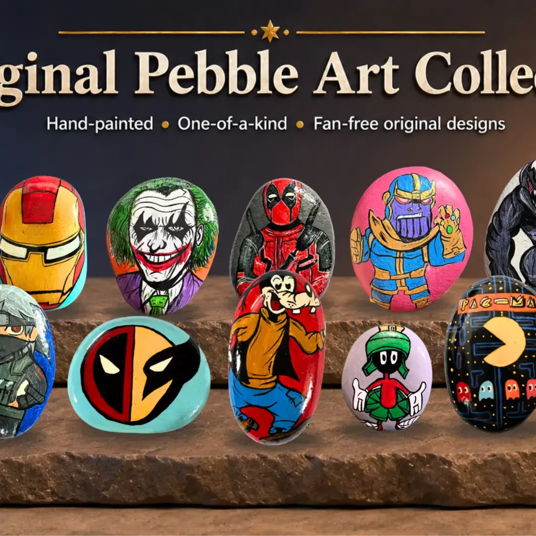 Original Pebble Art Collection featuring hand-painted, one-of-a-kind superhero and cartoon character designs on natural pebbles, including Iron Man, Thanos, Venom, Batman, Deadpool, Joker, Popeye, and
