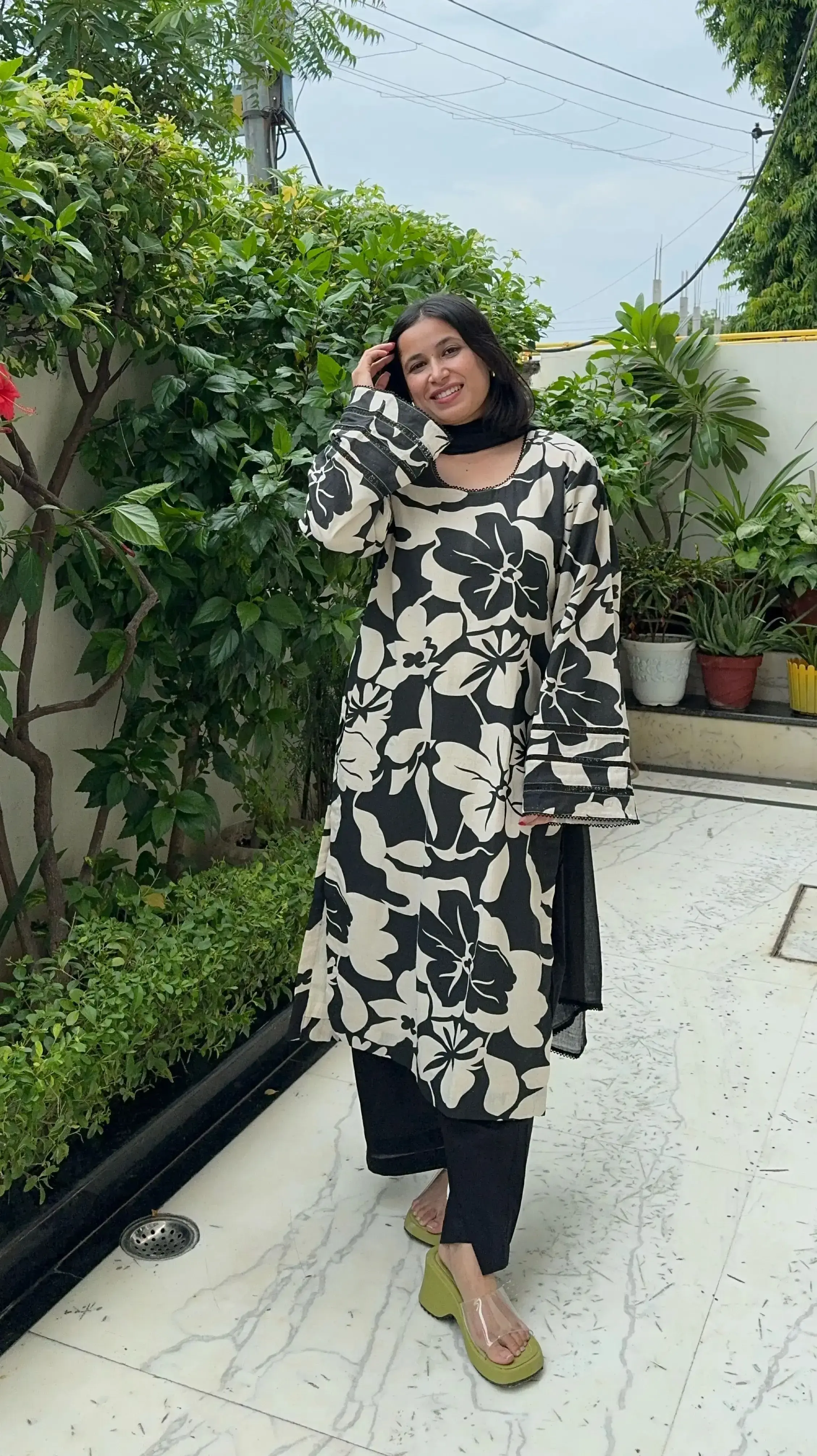 Black suit for women in cotton linen with off-white floral patterns and delicate lace detailing