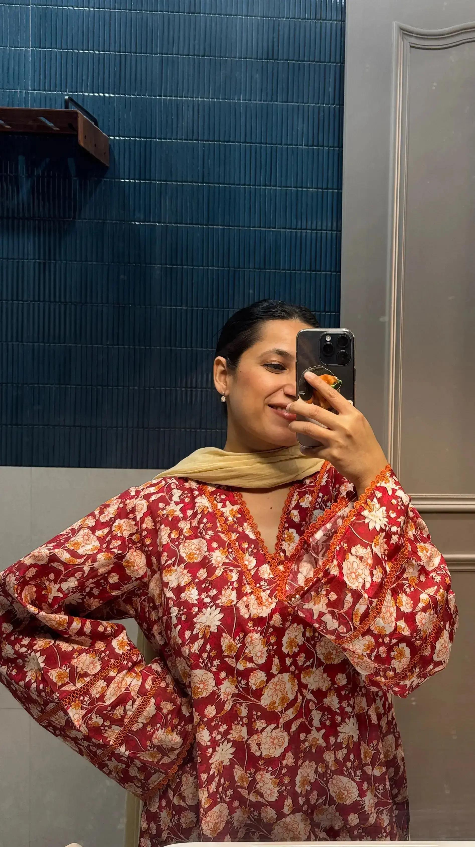 Rust red cotton farshi shalwar suit with lace details and beige dupatta